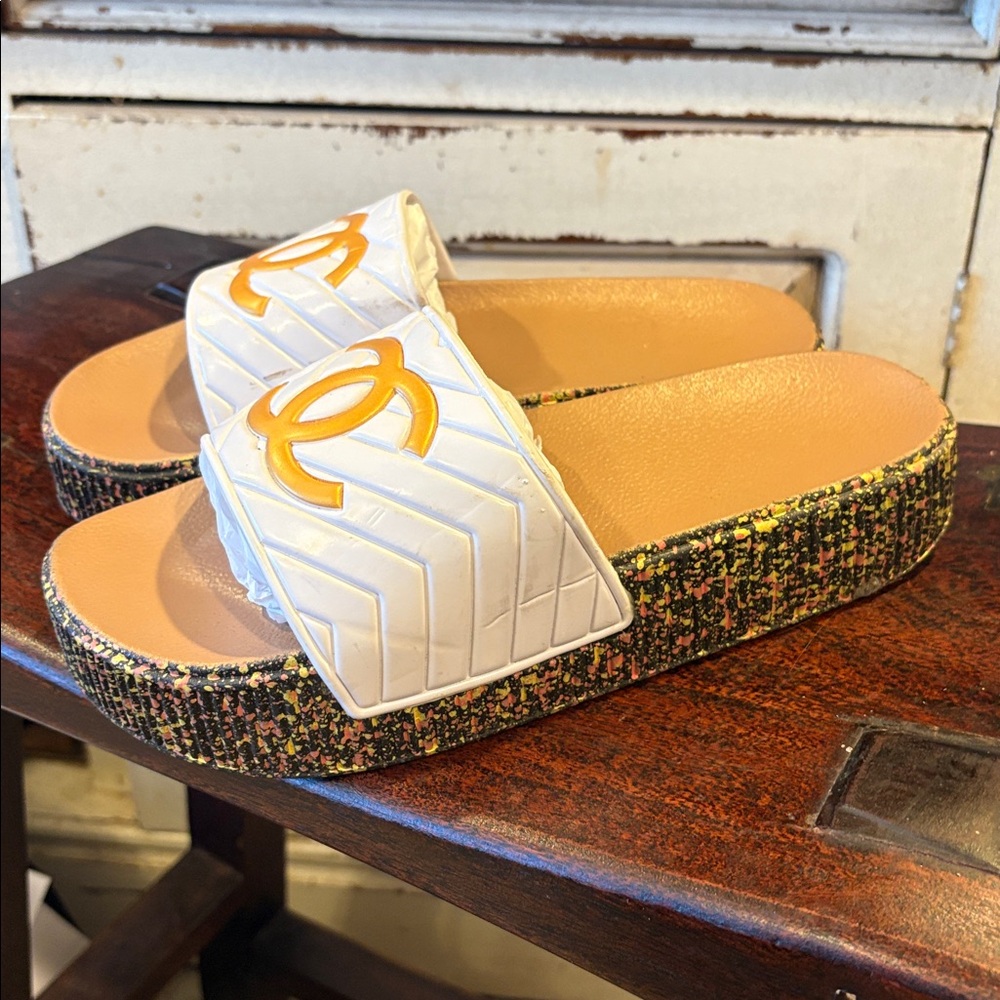 Sandals Feature A Large Gold Interlocking Large L… - image 2